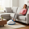Woman using a foot massager in a living room